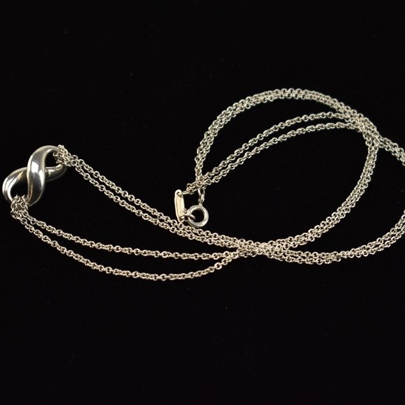 TIFFANY & CO: Sterling Silver "Infinity" Necklace - Picture 6 of 6